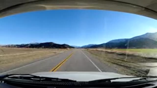 CENTRAL COAST CALIFORNIA-2019: Rapid Approaching Mountains And Blue Sky On A Sunny Day