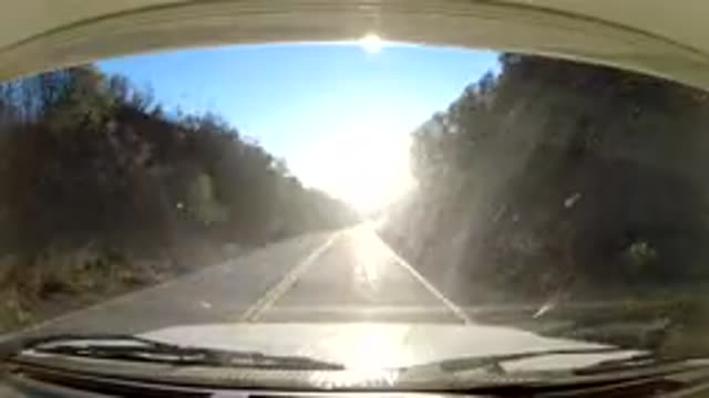 CENTRAL COAST CALIFORNIA-2019: Vehicle Moves Along Winding Mountain Road Film