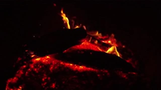 OJAI CALIFORNIA-2019: Warm Fire With Red Flames In Slow-Motion Burning Wood In