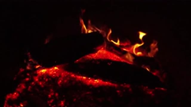 OJAI CALIFORNIA-2019: Red Burning Wood With Heavy Intense Flames On A Dark