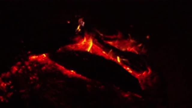 OJAI CALIFORNIA-2019: Slow Motion Log Fire With Red Hot Coals