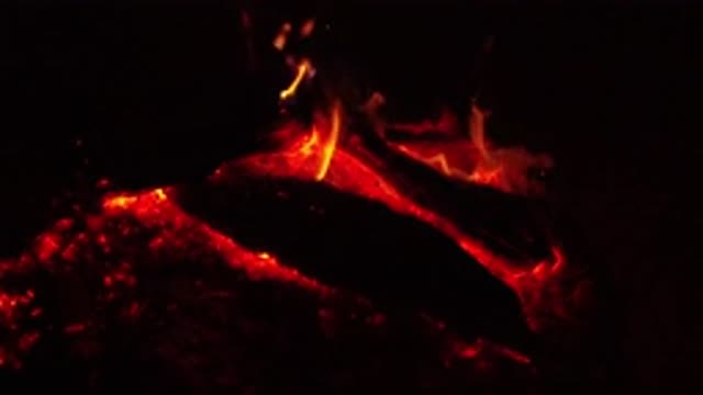 OJAI CALIFORNIA-2019: Fireplace Burning Slowly And Beautifully On Logs In A