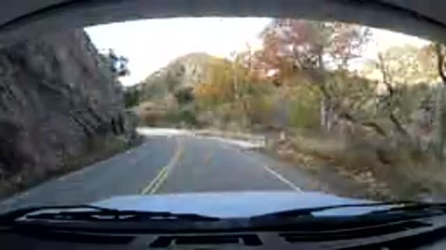 OJAI CALIFORNIA-2019: View From Inside Moving Vehicle On Winding Road Through Mountainous Area