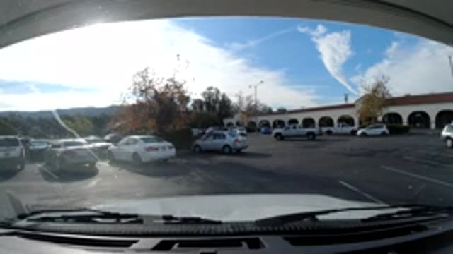 OJAI CALIFORNIA-2019: Half Empty Shopping Center Parking Lot And Blue Sky On A