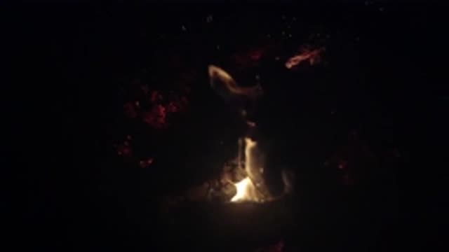 OJAI CALIFORNIA-2019: Large Yellow Flames Jumping From Small Controlled Campfire