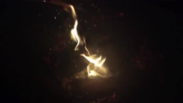 OJAI CALIFORNIA-2019: Light Flames Burn In The Deep Darkness Of The Night