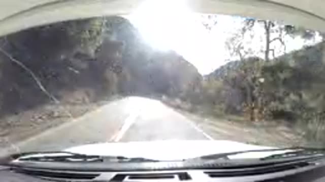 OJAI CALIFORNIA-2019: Time Lapse of a Traveling Car on an Empty Road