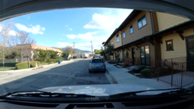 OJAI CALIFORNIA-2019: Video Taken From The Dashboard Of A Car Of A Street With Houses