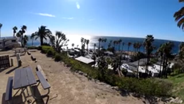 MALIBU CALIFORNIA-2019: Time Lapse The Landscape With Palm Trees And The Ocean