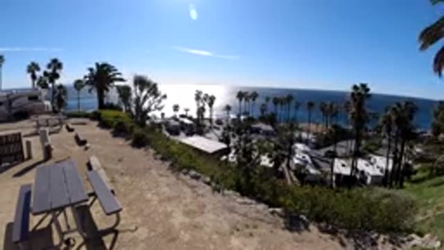 MALIBU CALIFORNIA-2019: Accelerated Coastal Scene Near The Sea Shows A Peaceful Place With Trees And Wind