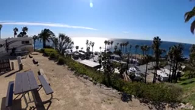 MALIBU CALIFORNIA-2019: View From Hill At Palm Trees Water Traffic Picnic Tables