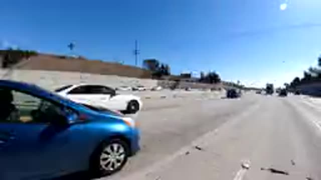 MALIBU CALIFORNIA-2019: Cars Taxis Racing Highway Shops Roadside Condos Offices