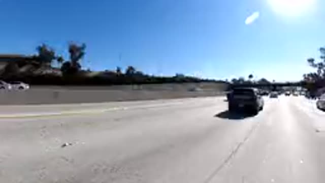 MALIBU CALIFORNIA-2019: Time Lapse of Running Cars on a Public Road