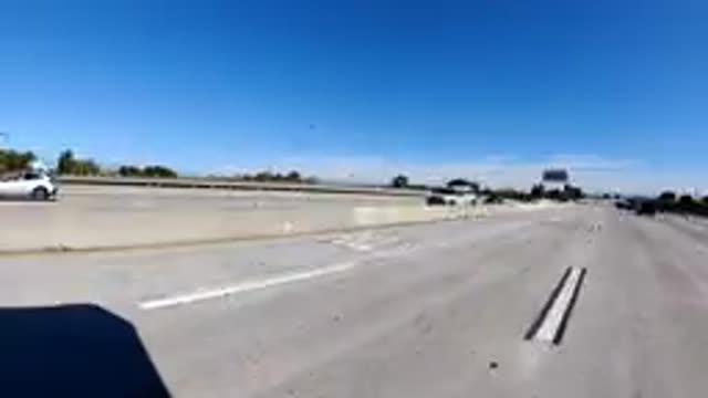 MALIBU CALIFORNIA-2019: A Time-Lapse Car Running On The Road In Daytime With