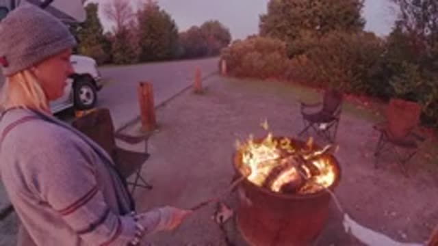 SAN CLEMENTE CALIFORNIA-2019: Mother And Daughter Make A Strong Burning Fire