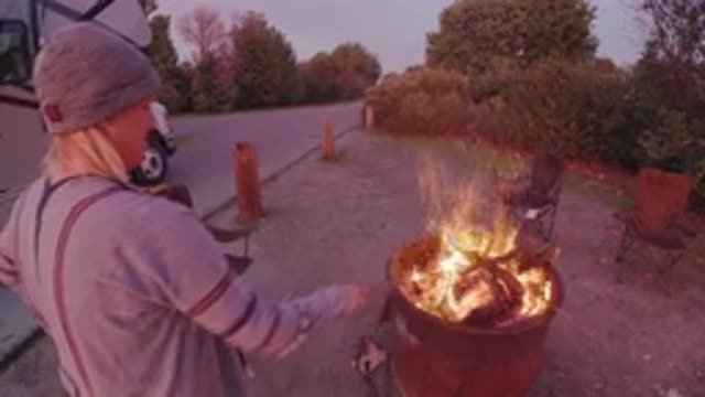 SAN CLEMENTE CALIFORNIA-2019: Person Traveling In A Camper Van Making A Campfire