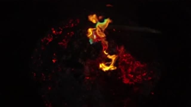 SAN CLEMENTE CALIFORNIA-2019: Unidentified Flammable Dark Material Burning in Yellow and Blue Flames