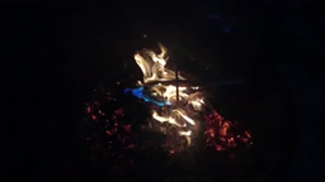 SAN CLEMENTE CALIFORNIA-2019: A Fire Large Burning Over Hot Coals In A Pit
