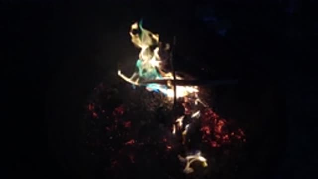 SAN CLEMENTE CALIFORNIA-2019: Wood Pile Burning in a Fire Pit at Night