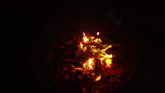 SAN CLEMENTE CALIFORNIA-2019: Well Lit Bonfire Burning In Slow Motion On A Cold Night