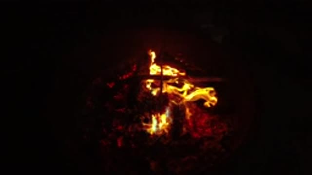 SAN CLEMENTE CALIFORNIA-2019: Bright Burning Red And Yellow Flame In The Dark Of