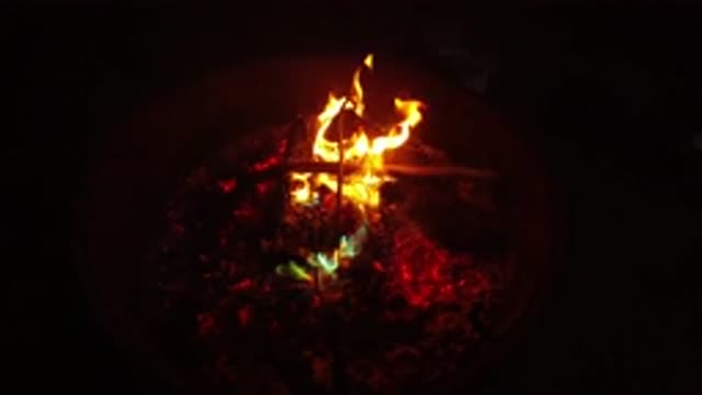 SAN CLEMENTE CALIFORNIA-2019: Romantic Couple Embracing With Fire in Background