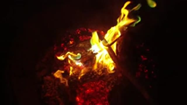 SAN CLEMENTE CALIFORNIA-2019: A Slow Motion Controlled Bonfire With Orange Flames