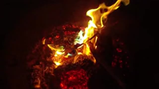 SAN CLEMENTE CALIFORNIA-2019: Roaring Campfire Burning Bright At Night Time With