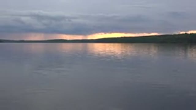 RED LAKE CANADA-2015: A Beautiful Sun Setting Over a Lake in the Evening