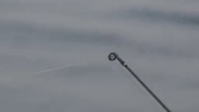 RED LAKE CANADA-2015: Ocean Water Love With A Fishing Line Cast Over Dreary Seas