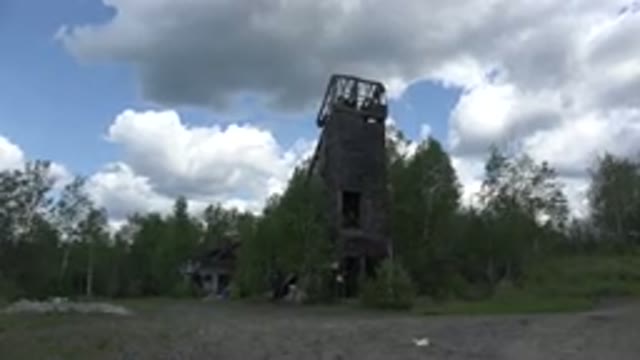 RED LAKE CANADA-2015: Deserted Wooden Fortress Among Trees In A Forest Under A