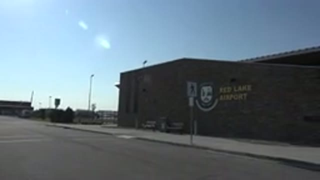 RED LAKE CANADA-2015: Sign on Building Reads Red Lake Airport Camera Pans From