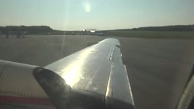 RED LAKE CANADA-2015: A View of an Airplane Wing from Inside a Grounded Plane