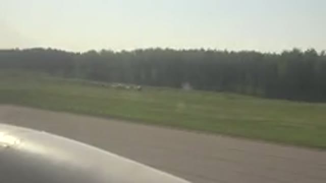 RED LAKE CANADA-2015: Small Plane Runway Take Off View With Small Aircraft