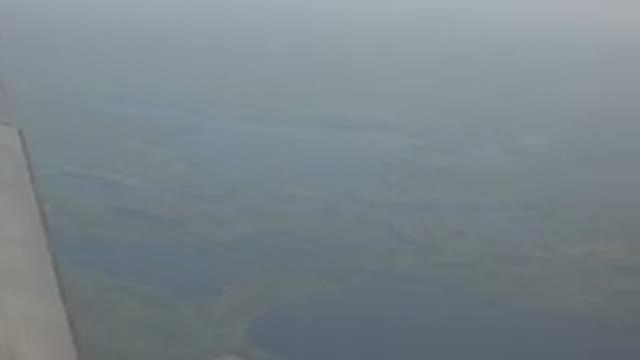 RED LAKE CANADA-2015: Looking Out The Window Of An Airplane We Can See A Part Of