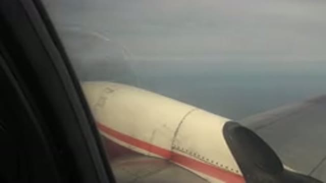 RED LAKE CANADA-2015: Airplane Propeller Flying Over Ocean From One Place
