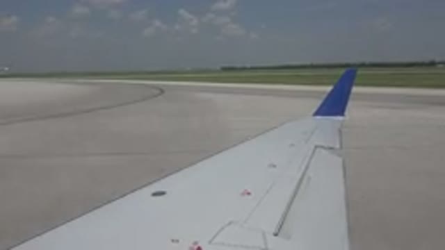 WINNIPEG CANADA-2015: Plane Preparing To Take Off On A Clear Sunny Day