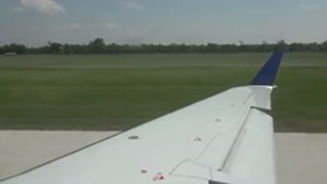 WINNIPEG CANADA-2015: The Wing Of A Fast Moving Plane On The Landing Tracks