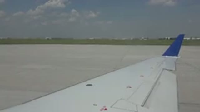 WINNIPEG CANADA-2015: Blue Tip Airplane Wing Seen From Window