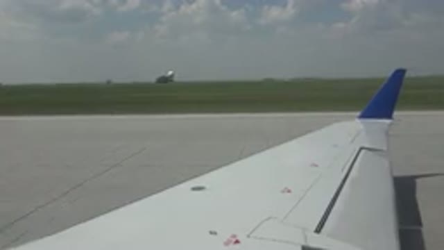 WINNIPEG CANADA-2015: View From Airplane Wing While Gaining Speed On Runway Near