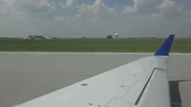 WINNIPEG CANADA-2015: The Wing Of A Plane While Taxiing In The Runway