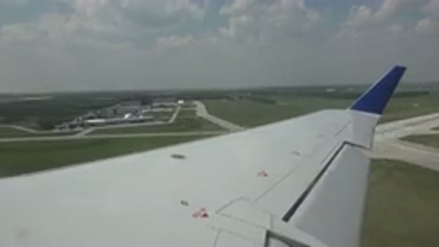 WINNIPEG CANADA-2015: View From Over Plane Wing At Takeoff