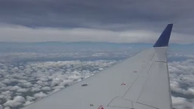 WINNIPEG CANADA-2015: Aerial White Clouds And Blue Sky On A Clear Day