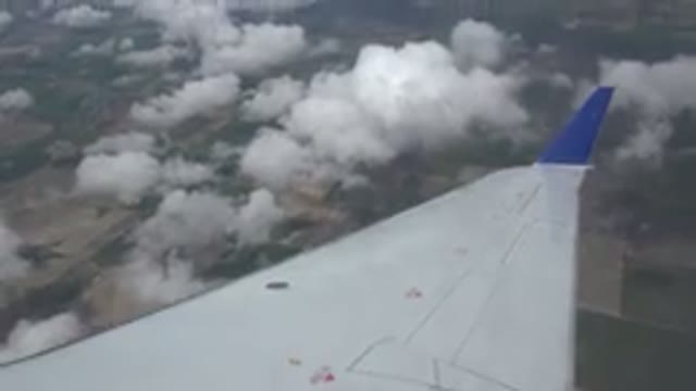 WINNIPEG CANADA-2015: Sitting At The Window Seat Of The Plane And Watching The