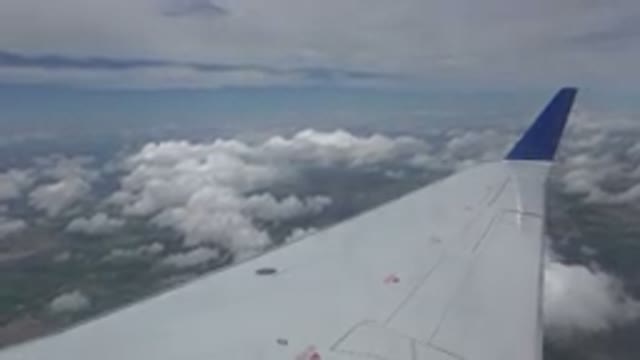 WINNIPEG CANADA-2015: A Window View of the Wing of a Plane