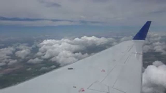 WINNIPEG CANADA-2015: Overlooking Ground From Airplane Wing Smoothly Flying Over