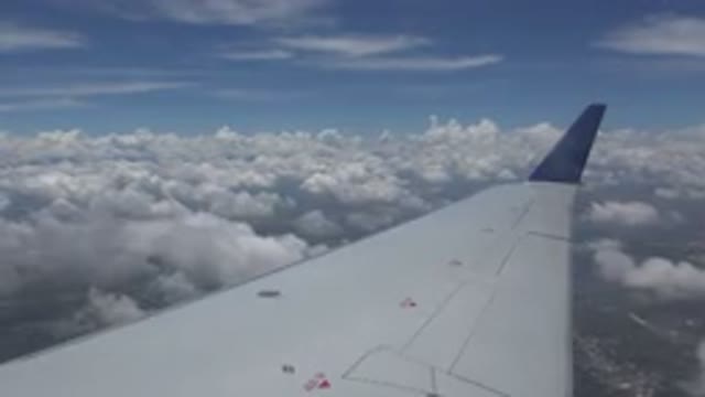 WINNIPEG CANADA-2015: View From An Airplane Window Below The Blue Sky