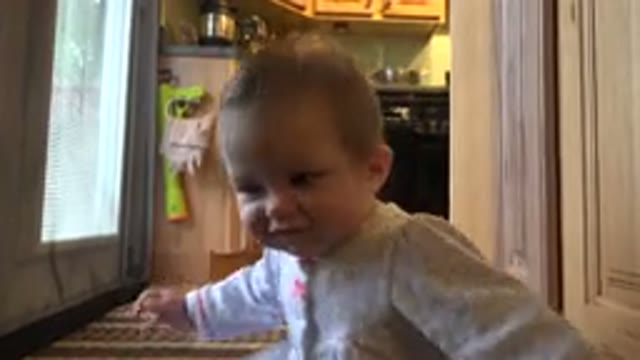 WESTMINSTER COLORADO-2015: Blonde Baby Smiling While Playing With Camera