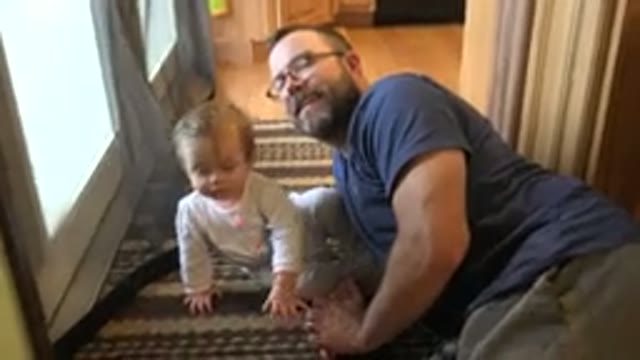 WESTMINSTER COLORADO-2015: A Cute Toddler Crawling and Having Fun Beside Her