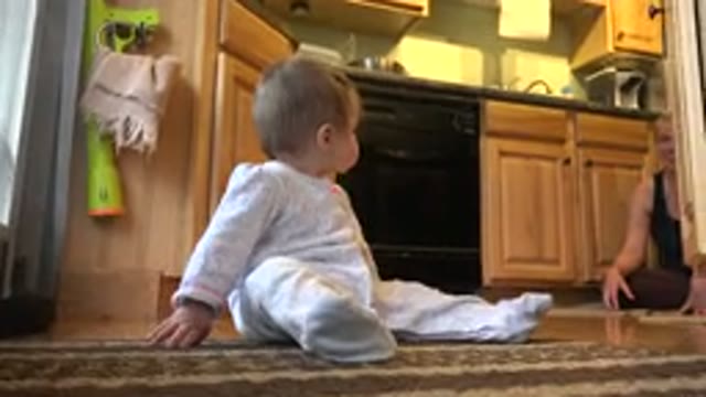 WESTMINSTER COLORADO-2015: Cute Little Toddler And Mother Sitting On The Floor